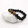 Perline Trendy 10Mm Bracciali in pietra lavica nera Chakra Healing Nce Yoga Bracciale perline per donna Stretch Tiger Eye Charms Jewe Dhgarden Dhzb4