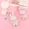 Ny söt tecknad fluffig kanin nyckelchain rosa bunny docka nyckelring för flickor väska ornament hörlurar fall tillbehör vänskap gåva