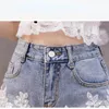 Jeans bugilaku hög midja breda ben byxor blomma applikationer lapptäcke casual denim jeans shorts kvinnor streetwear mode allmatch kort