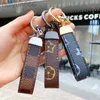 Luxury Men Waist Buckle Leather Presbyopia designer Keychain Pendant Car Key Chain Ring Fashion Couple Creative Gift