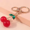 Nyckelringar Ny Crystal Cherry Keychain Creative Fruit Key Chain Cute Girl Ring Chains Women Men Handbag hängsmycken MNWJ