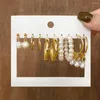 Diseño de pendientes de aro círculo grande exagerado para mujer chica moda perla giro C forma conjunto accesorios de joyería de fiesta