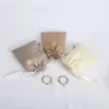 Links de manguito 100pcs Sacos de presente de jóias de veludo de seda personalizados
