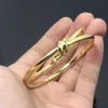 Bracelet de marca original nudo nuevo Producto NUEVO diseño de moda de oro desnudo Personalidad avanzada Butterfly Rope envuelta con logotipo