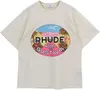 Cotton Mens T Rhude Shirt Summer Rhude Fashion Short Sleeve T-Shirt Tecknad bokstäver Tryckt Lovers Casual Joker Hip-Hop Shirt.