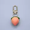 Keychains Heart Peach Fruit Food Keychain Leuke creatieve cartoon Minimalist voor vrouwen Men Beste vriend Gift Key Ring Sieraden