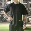 Męskie tshirty mięśni T -koszulka kulturystyka fitness Mężczyźni Tops Bawełniane singlety plus duży rozmiar Tshirt Mesh Lose krótkie rękaw 230518