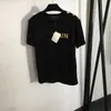 Tasarımcı Tişört Pamuk Kısa Kollu Kadın Giysileri Damgalı Yazı Logosu Baskı Omuz Düğmeleri Dekorasyon Tshirts Yaz Moda Kadın Giyim