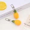 Nyckelringar simulering ananasfrukt nyckelring nyckelring för kvinnor män gåvor nya roliga kreativa matväska Box Keychain