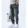 Мужские джинсы Jogger мужчины гарема штаны High Street Denim Lose Blue Grey вымытые брюки плюс четыре сезона груз 230519