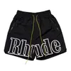 Rhude Shorts Mens 디자이너 짧은 남성 세트 트랙 슈트 바지 느슨하고 편안한 패션 인기 2024 새로운 스타일 S m l xi 폴리 에스터 느슨한 체육관 반바지 cda