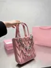 23 All'inizio della primavera Nuova mini borsa a pieghe Mini borsa a mano con catena di diamanti d'acqua Dolce borsa manuale musicale Borsa a tracolla obliqua a spalla singola Donna 230519