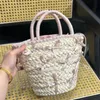 Bowknot Bucket Bucket Bag Bag Women Hollow Out Crochet Utses Handmade Straw Straw Fectable Basket Bask Factor Summer Bag مع حقيبة صغيرة