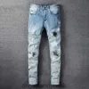 Amirres dżinsy designer spodnie Man moda marka jasna kolor myjka dżinsowa woda rozpryskiwanie atrament stretch zrób stare otwory rozciągnij Slim Fit Mała stopa High Street Jean B94m