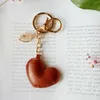 Porte-clés femmes en cuir coeur porte-clés nouveau cuir étoile de mer pentagramme porte-clés avec breloque sac pendentif porte-clés cadeau de fête