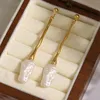 Pendientes de aro AENSOA exquisita perla fresca al agua colgante largo gota elegante Color dorado barroco para mujer joyería de boda