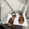 Lyxdesigner sandaler glider gladiator kvinnor triomphe cross rand skor taillat lägenheter kalvskinn sandaler tofflor strand platt vegetal solbränna sandaler skor med låda