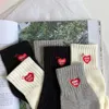 Tide Brand HUMAN MADE Love Serviette brodée Bas Tube court Chaussettes de sport pour hommes et femmes