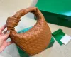 Mini Jodie geweven koppelingszakken vrouw ontwerper handtassen bakken geknoopte polsbag kleine mode lederen groene portemonnee dames handtas tote