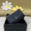 Модная сумка на плече xioxiang Home Luxury Designer Bag Металлическая цепь черно -белая женская сумка для подмышки для овчины с золотой пряжкой кошелек. Кошелек 19см 19 см.