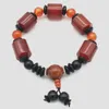 Brin À La Mode Joker Irrégulier Cylindrique Naturel Noir Et Rouge Noxy Pierre Perle Bracelet 2 pcs Cordon Élastique Hommes Femmes