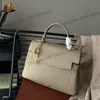 Borse da donna francesi con manico Lockme Tote Bag in vera pelle Multi Pochette Borsa con tracolla a catena intrecciata Borse a tracolla con ciondolo con nappa portafortuna 23x15 cm