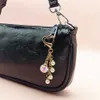 Nouveau luxe perle gland porte-clés mode amour coeur pendentif pour femmes sac ornements voiture porte-clés accessoires créatif bricolage porte-clés