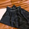 Brev webbing kvinnor klär svart hög midja kjol ins mode street stil kjolar 204o