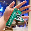 Creative New Mini Basketball Shoes Stereoskopisk modell Keychains Sneakers Entusiast Souvenirs Keyring Car Ryggsäck Present G220421