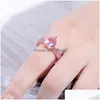 Avec des pierres latérales diamant coeur bague cuivre de haute qualité plaqué or 14 carats glacé zircon cubique anneaux hip hop mode bijoux cadeau F Dhpbq