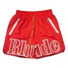 2023 Rhude Designer Men Shorts Summer Fashion Beach Pants High Quality Hot Sale Men's Fitness Half Drawstring Lettered Multi Style Hip-hop Street Basketball