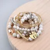 Bracelets BOJIU Multilayer Natural Stone Bracelets For Women Gold Zirconia Tube Spring White Howlite River Stone Crystal Bracelet BCSET199