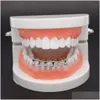 Grillz Dental Grills Gold Sier Grillzsシングルトゥースグリルツキャップトップボトムグリルブリングカスタム歯火山ロックドロップシェイプパンクHI DHKQB