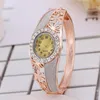 Orologi da polso Top Luxury Women Bangle Watch Strass Hollow Flower Band Chiusura pieghevole Quadrante ovale Analogico da polso al quarzo Reloj De MujerWristwa