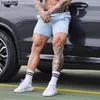 Heren t-shirts Gyms Shorts Men Black Witte compressie Fitness Shorts Men Bodybuilding Causale shorts Mannelijke zomer Snel droge spandex shorts Homme J230522