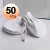 Boîtes 50pcs / lot blanc auto-scellant rose bundle enveloppe d'expédition sac de velours noir sarcelle flanelle bijoux pochette cadeau tissu de polissage