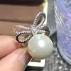 Ketting oorbellen zet goud vergulde koperen bodem 2023 stijl ingelegde witte shell kralen Koreaanse mode boog knoop diamantpak vrouwen 14 mm