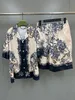 Chemise de designer de luxe duo de mode pour hommes plage roi soleil chemise de bowling imprimée chemise décontractée à fleurs hawaïennes à manches courtes variété ample