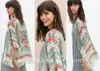 Kvinnors blusar skjortor kvinnor sommarlovet boho blommig tryck tunna se genom tofs halv ärm cardigan strandkläder cape woman topps 230519