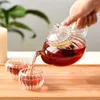 La vaisselle place le pichet en cristal de verre de bouilloire de thé de Stovetop pour la floraison de théière
