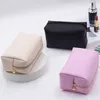 Bolsas de cosméticos Casos PC Bolsa de maquiagem de couro de cor sólida para mulheres zíper grande fêmea de bolsa de cosméticos Feminino Saco de produtos de higiene