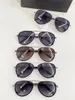 Nuovi occhiali da sole da pilota di design alla moda 5052 montatura in metallo e acetato occhiali di protezione uv400 per esterni dallo stile popolare e semplice