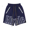 2023 Rhude Designer Men Shorts Summer Fashion Beach broek Hoogwaardige groothandel aangepaste unisex Letter Afdrukken Elastische Basis Running Doe