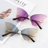 Lunettes de soleil papillon en forme de diamant femmes mode luxe personnalité sans cadre lunettes Y2k Vintage surdimensionné lentilles