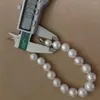 Strand High Luster Nature Freshwater Pearl Armband med 925 Silver Clasp Big Near Rund-diameter 11-13 mm