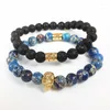 Strand 2023 Design High Grade Men Jewelry 8mm Black Lava Stone And Blue Sea Sediment Bead With Gold-color Skull Bracelet