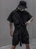 Herrspårar houzhou techwear kort jumpsuit för män svarta bodysuits overaller gröna manliga japanska streetwear sommarfickor hiphop 230520