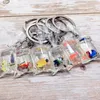 Mini Transparent Resin Fish Keychain In Water Bag Pendant Keyring Charms Bag Car Key Pendant Keychain Decor Accessories