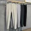 Pantalones de hombre 2023 primavera verano pantalones casuales de hombre traje pantalón ajustado trabajo cintura elástica Jogging pantalones hombre negro gris de talla grande 40 42