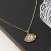 Colliers pendentif collier mode femme cuivre micro-ensemble Zircon coloré oeil chanceux petit cadeau de vacances frais